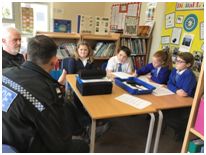 Bramfield Primary School pupils with PC Simon Green and Andrew Niven